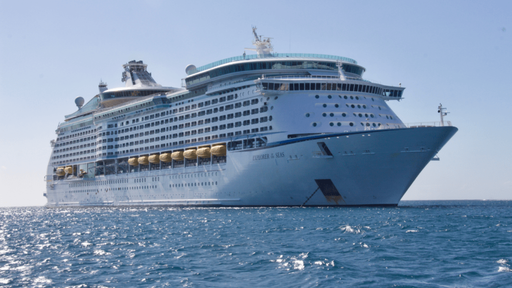 a large white cruise ship in the ocean