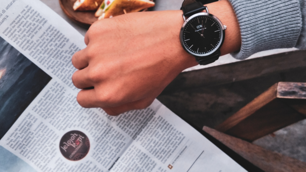 a person wearing a wrist watch