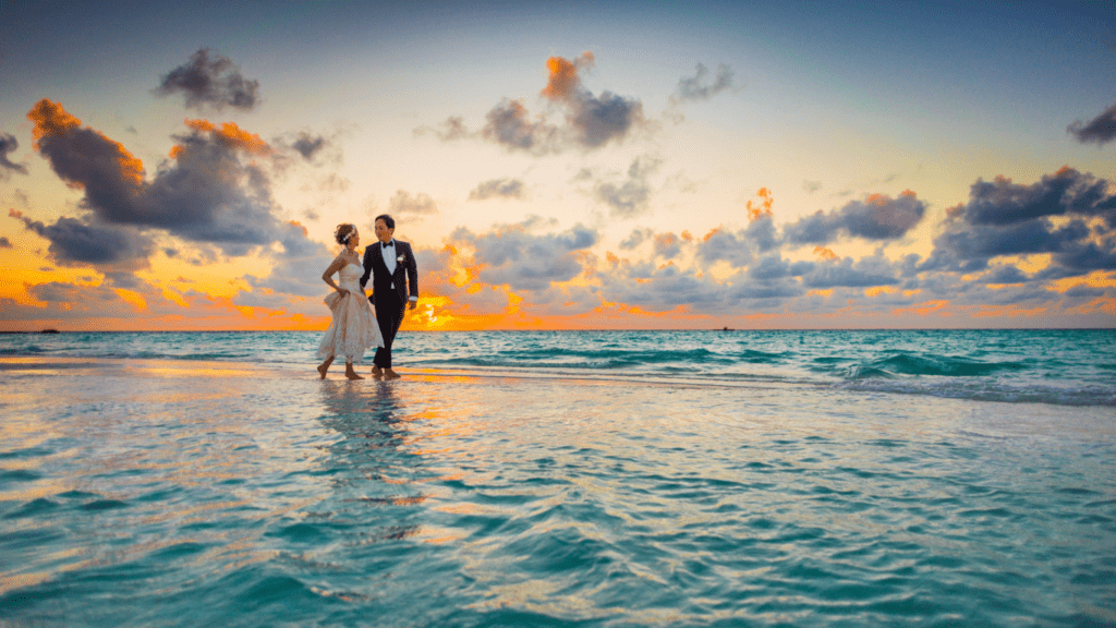wedding couple on the beach at sunset